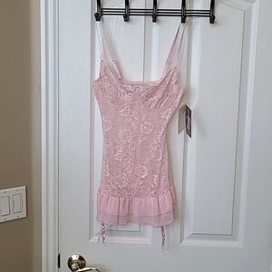 Pink lace baby doll lingerie.